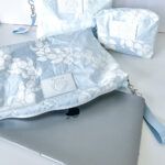 Puakenikeni Curvilinear Lei WRISTLET POUCH